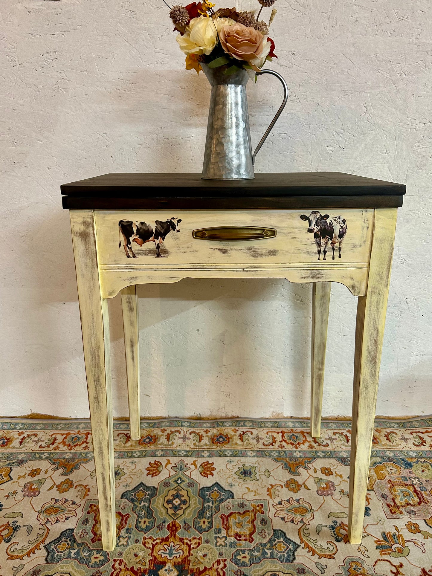 Antique cow-theme sewing table