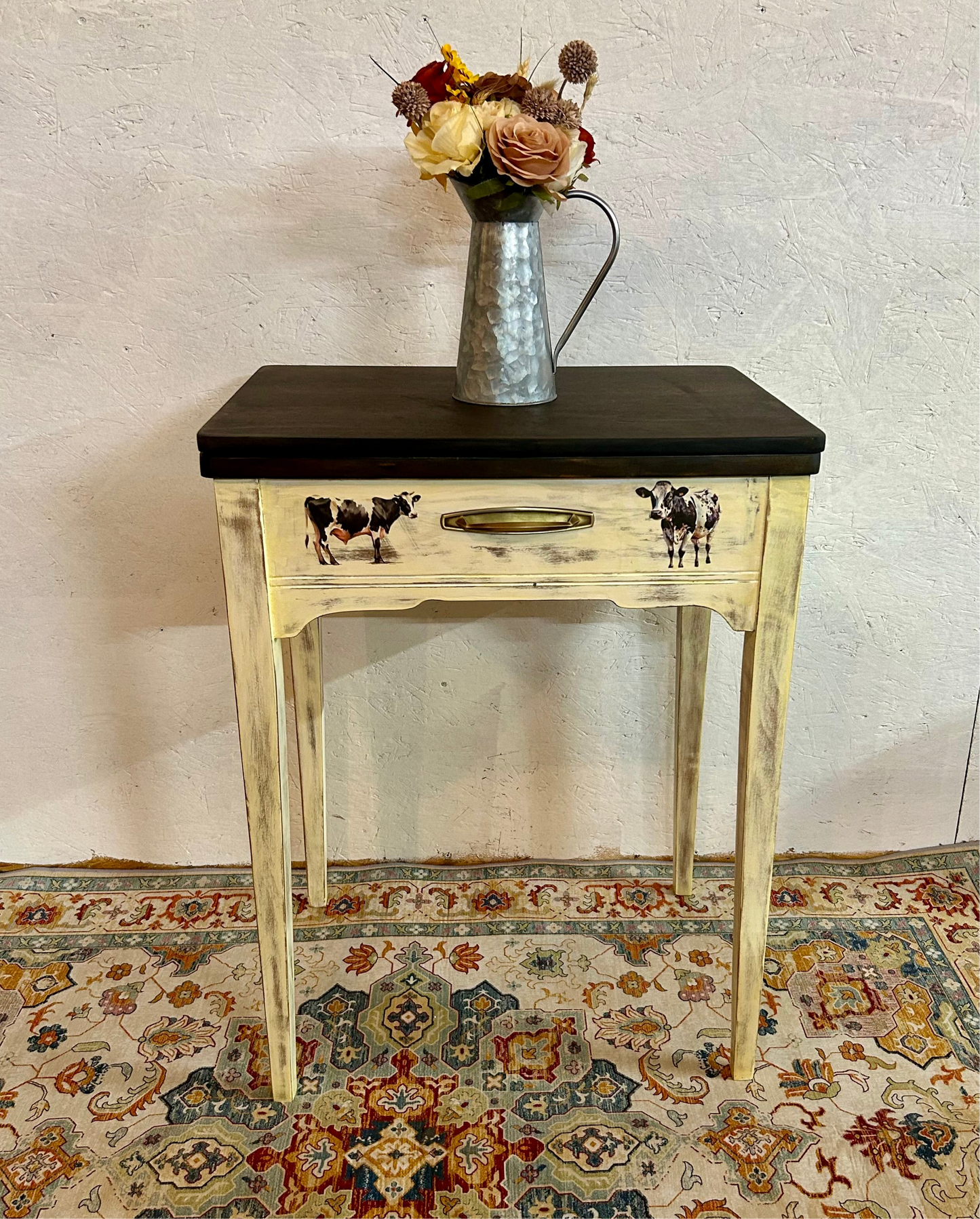 Antique cow-theme sewing table