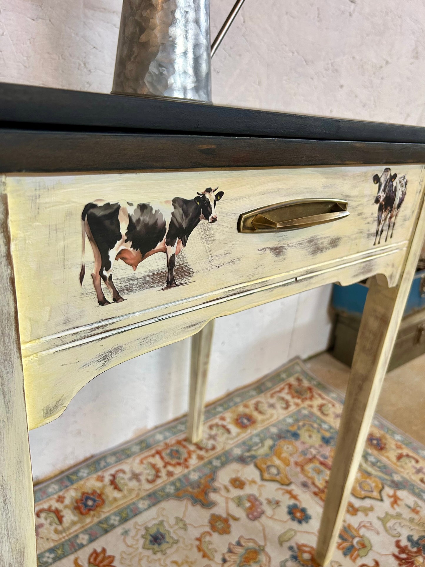Antique cow-theme sewing table